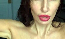 Russian pornstar strip show Liza Virgin sucks and blows on her pits and big boobs in a up close and personal video